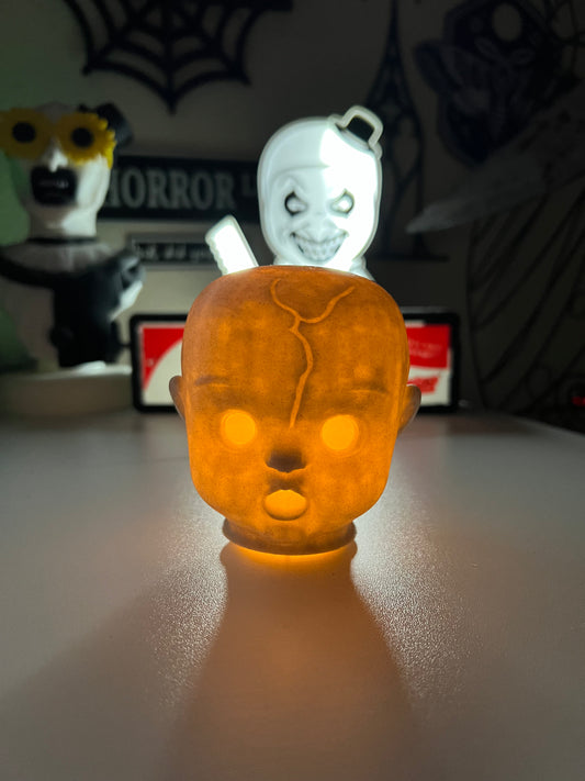 Creepy doll head