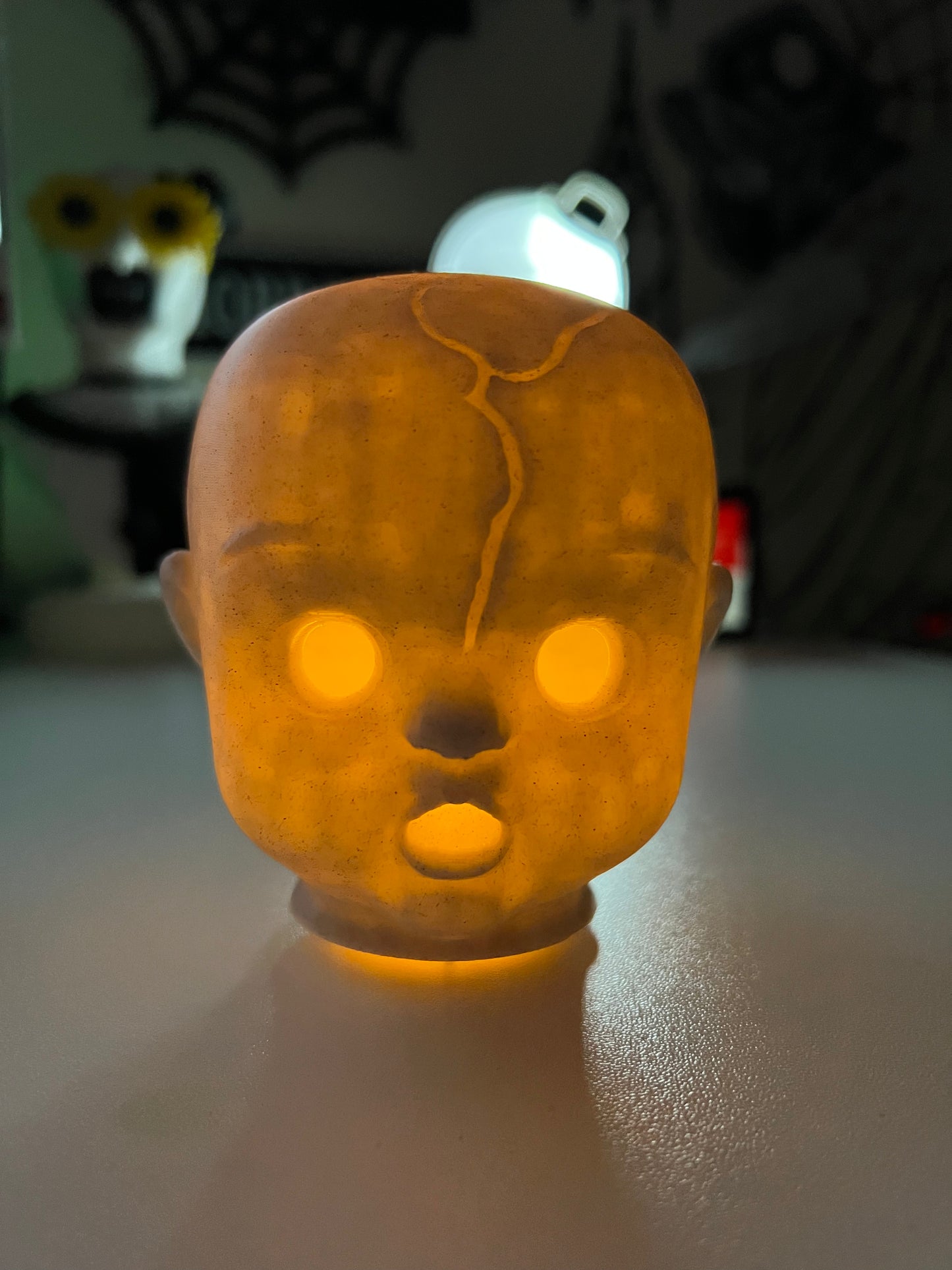 Creepy doll head