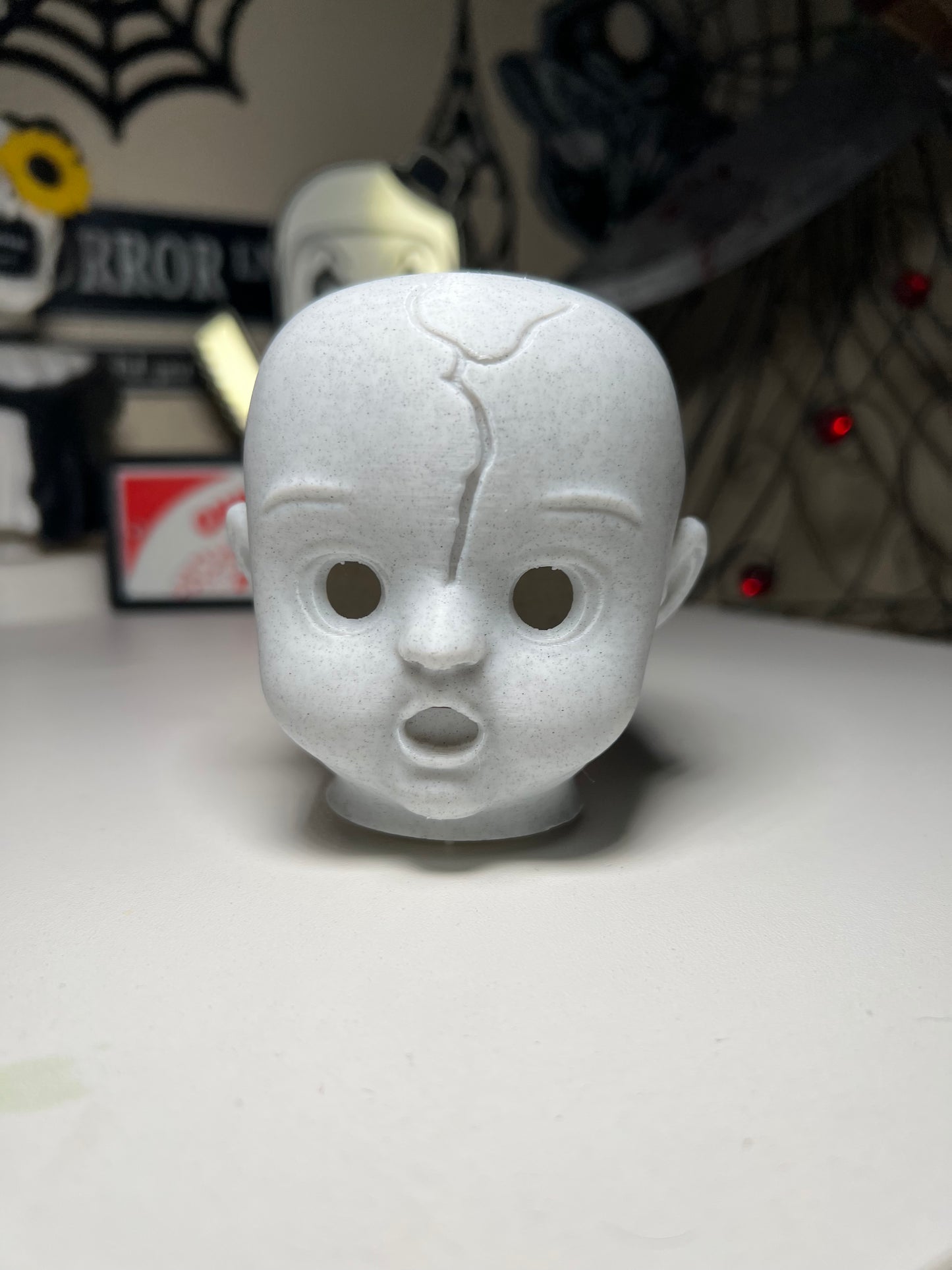 Creepy doll head