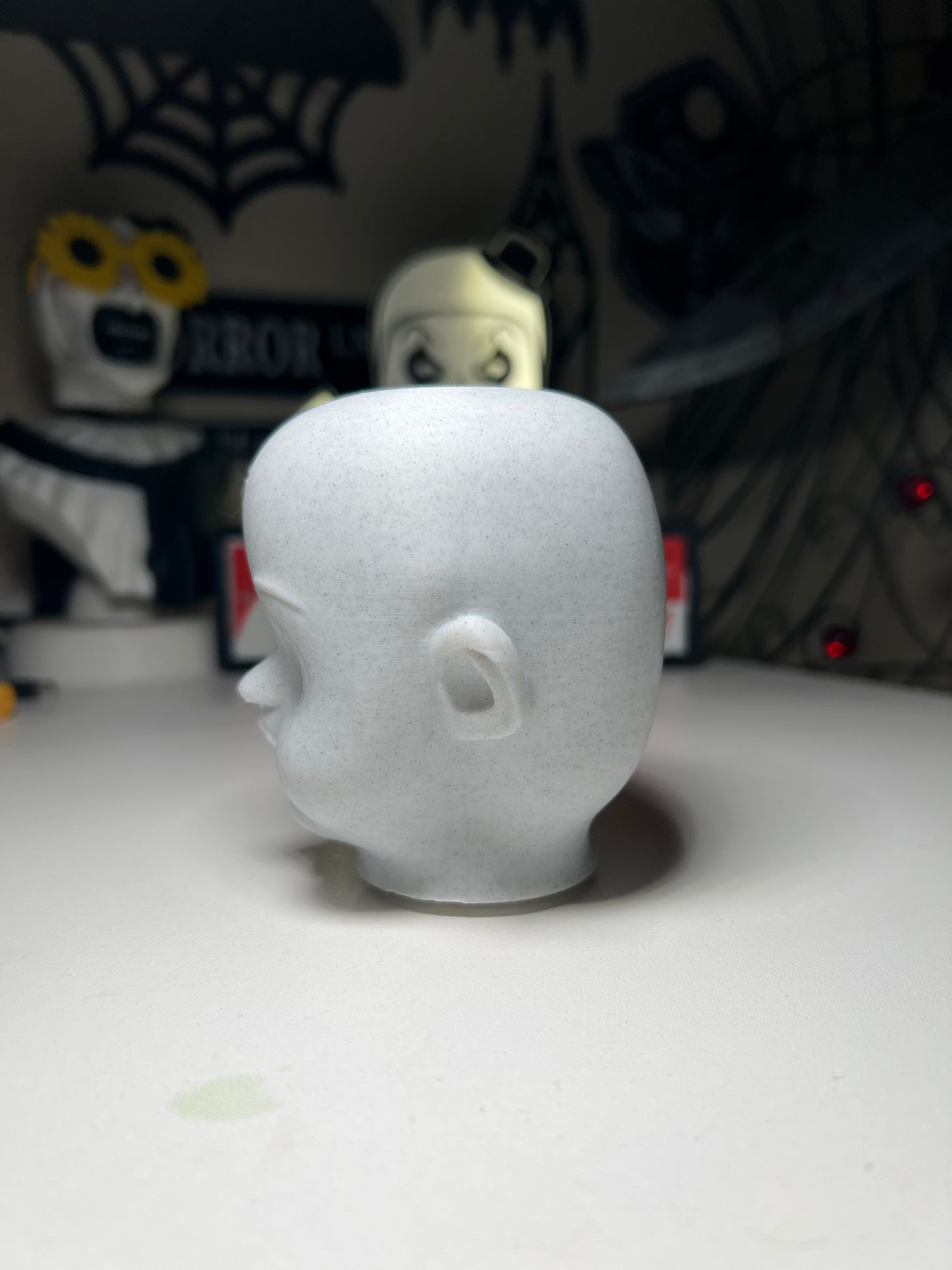 Creepy doll head