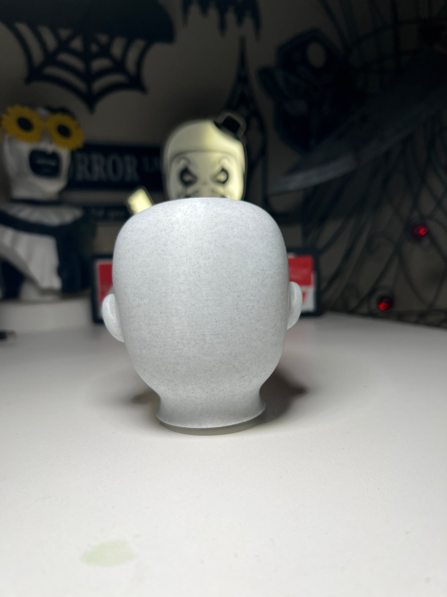Creepy doll head