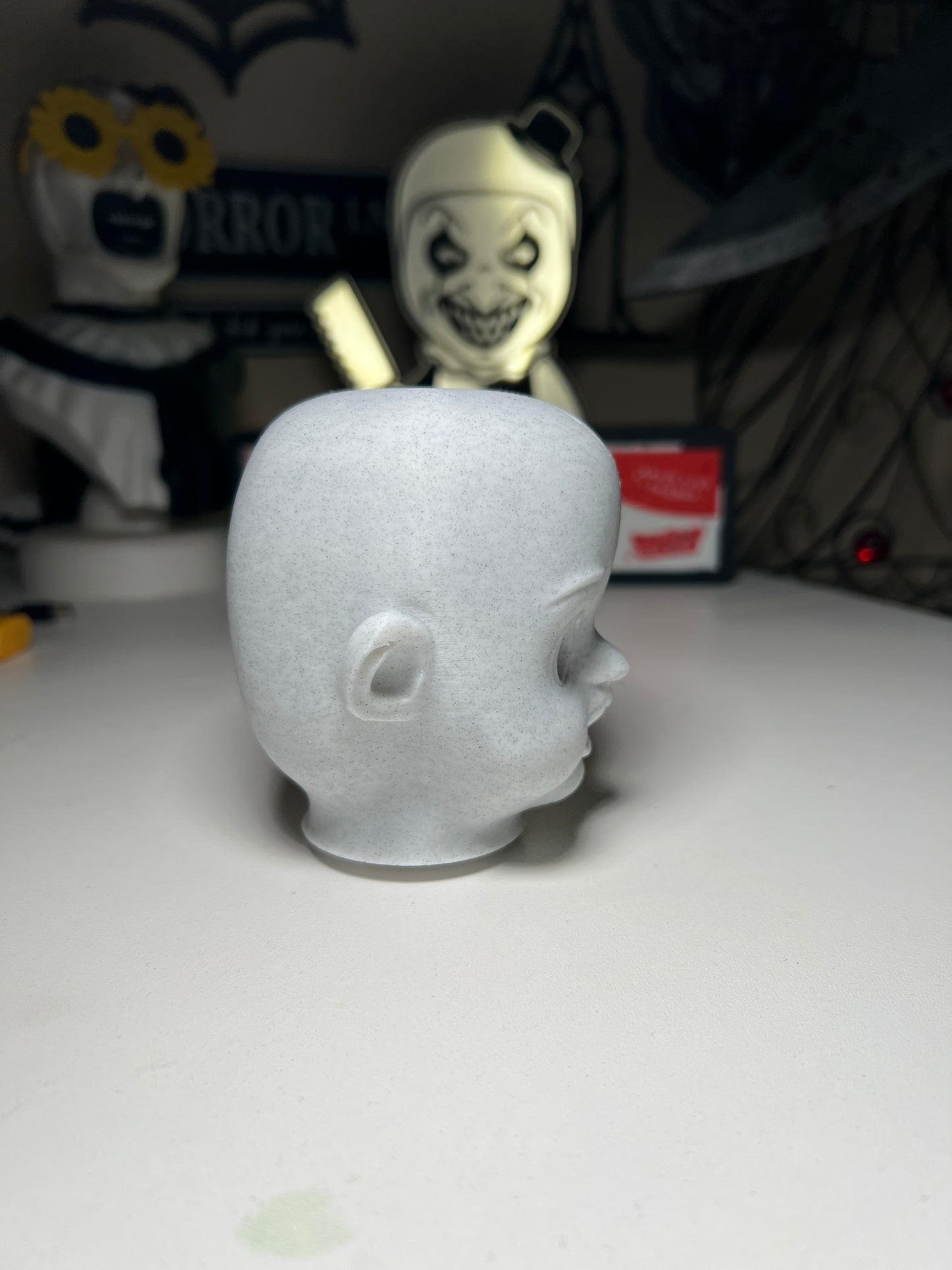Creepy doll head